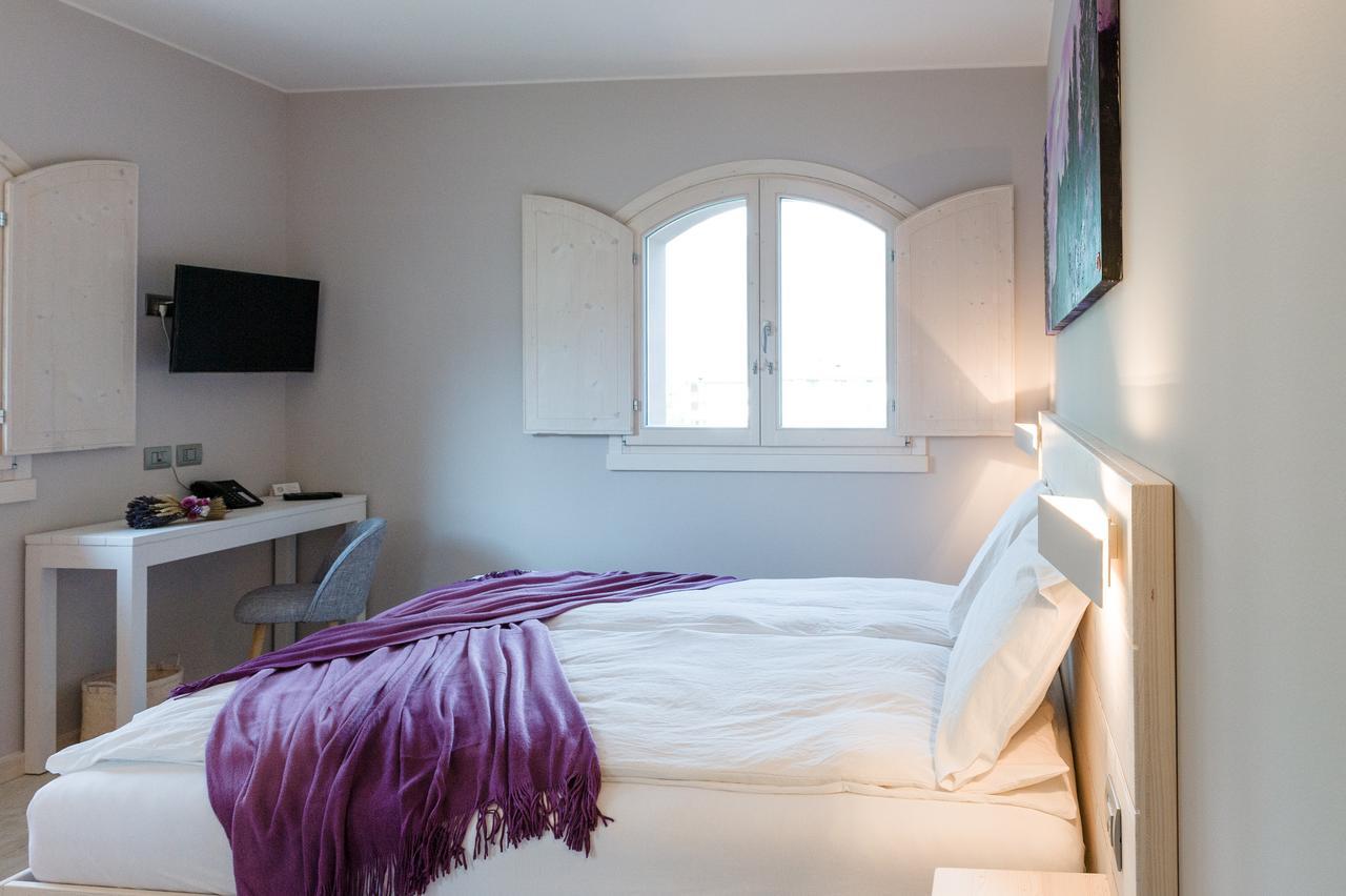 Bianco Hotel Primaluna Pokoj fotografie